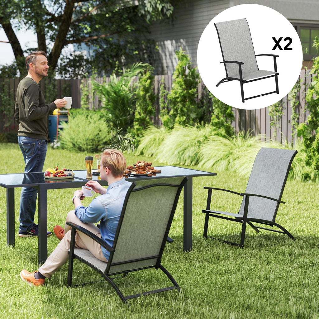 Two people sitting at a table outdoors with two chairs, one of which is shown in detail.